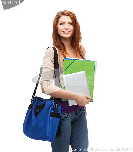 Image of smiling student with bag, folders and tablet pc