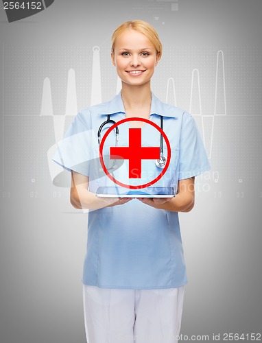 Image of smiling female doctor or nurse with tablet pc