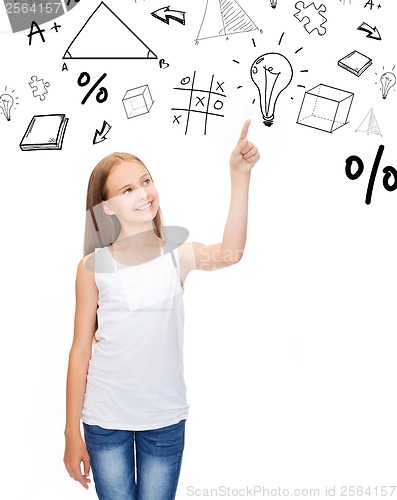 Image of girl in white shirt pointing to idea