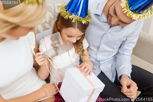 Image of happy family with gift box
