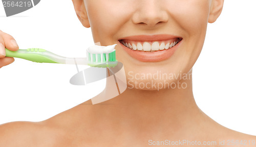 Image of woman with toothbrush