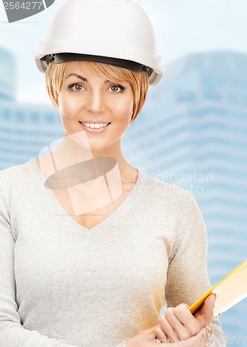 Image of female contractor in helmet with bluepring