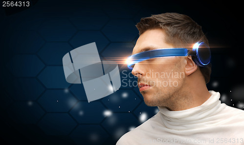 Image of serious man with futuristic glasses