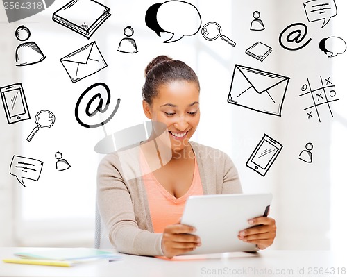 Image of smiling student girl with tablet pc