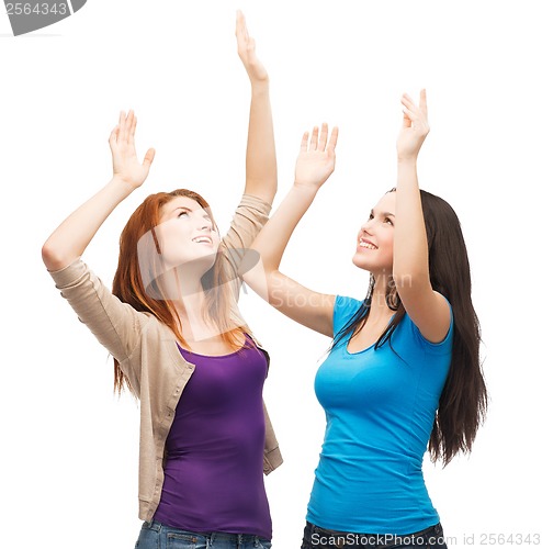 Image of two happy dancing girls