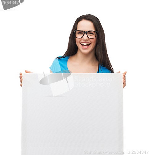 Image of smiling girl with eyeglasses and white blank board