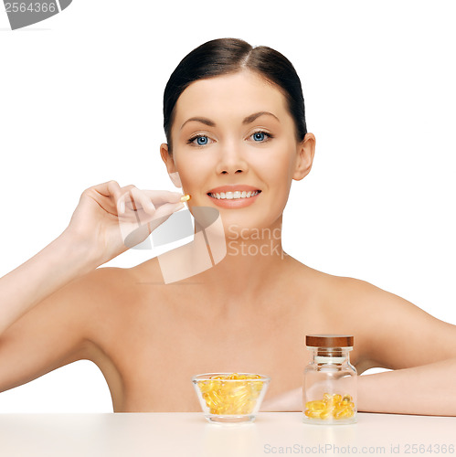 Image of beautiful woman with omega 3 vitamins