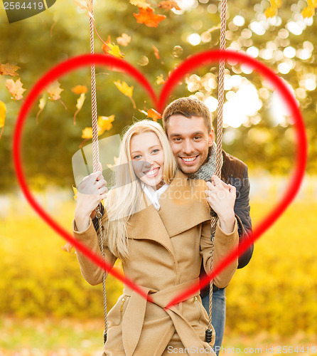 Image of romantic couple in the autumn park