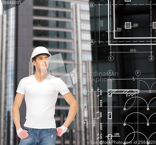 Image of handsome builder in white helmet