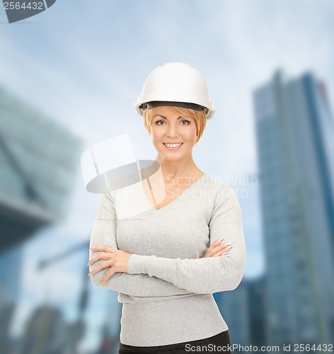 Image of female contractor in helmet