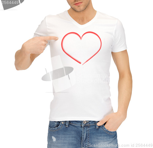 Image of man in white t-shirt with heart