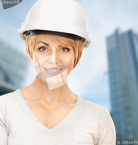 Image of female contractor in helmet
