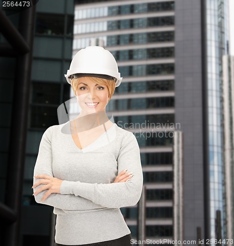 Image of female contractor in helmet