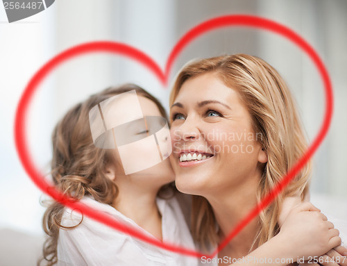 Image of smiling mother and daughter hugging