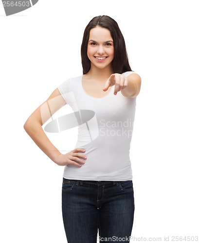 Image of teenager in blank white t-shirt pointing at you