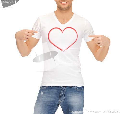 Image of man in white t-shirt with heart