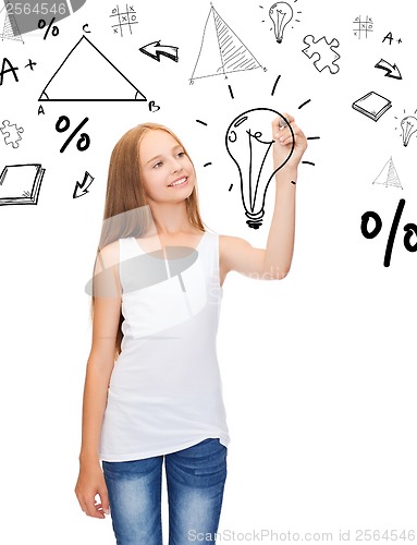 Image of girl in white shirt drawing idea on virtual screen