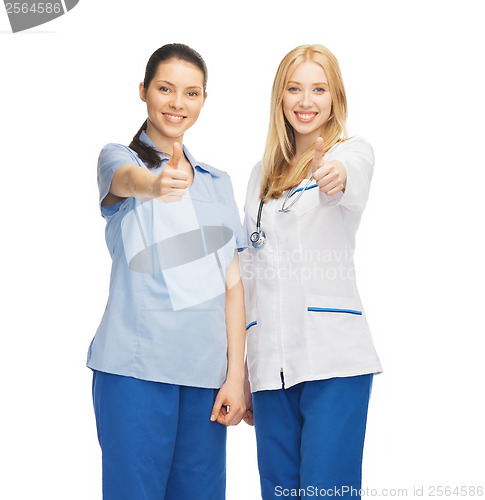 Image of two doctors showing thumbs up