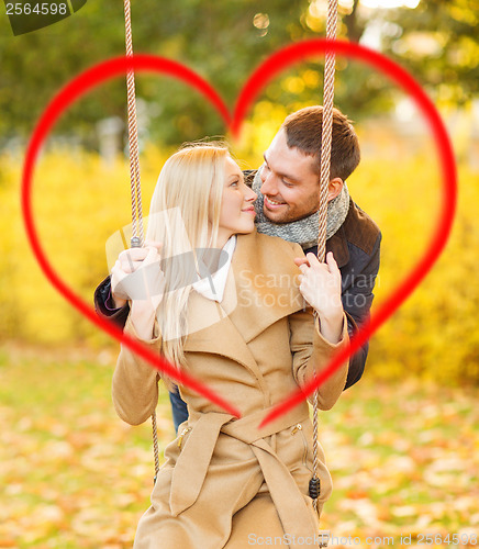 Image of romantic couple in the autumn park