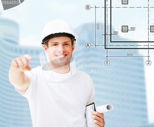 Image of male architect in white helmet pointing at you