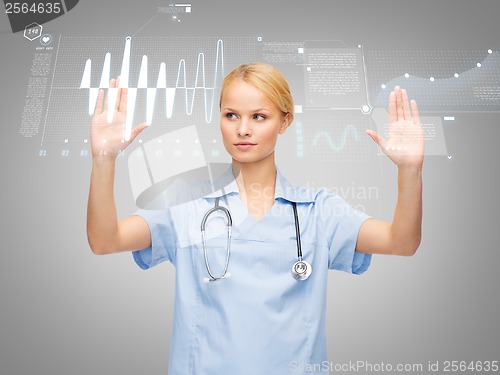 Image of doctor or nurse working with virtual screen