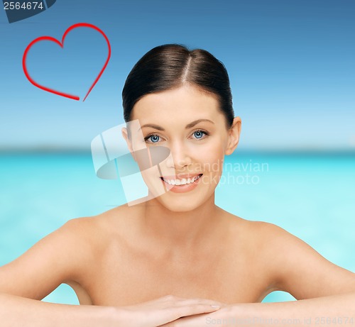 Image of face and hands of beautiful woman