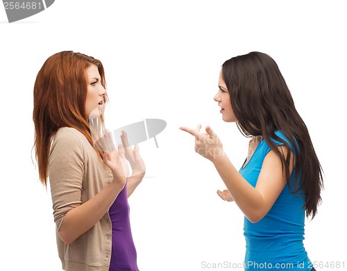 Image of two teenagers having a fight