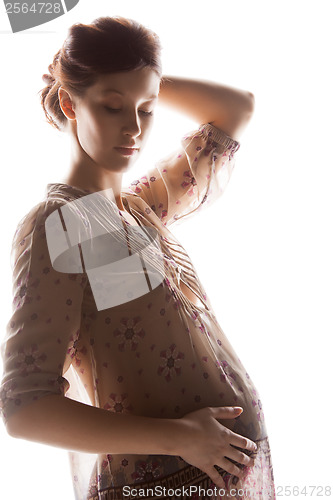 Image of silhouette picture of pregnant beautiful woman