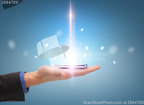 Image of man hand with smartphone