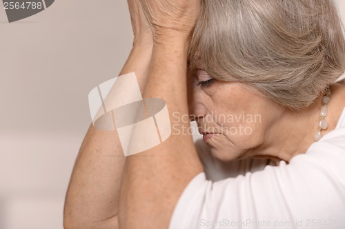 Image of Senior sad woman