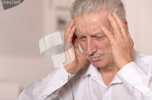 Image of Thoughtful elderly man