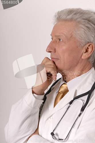 Image of senior doctor on white
