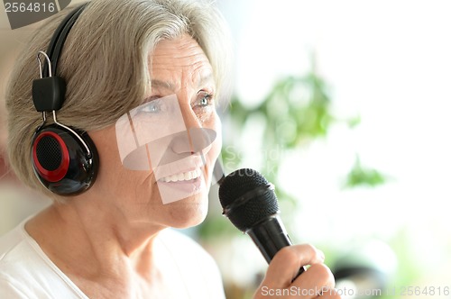 Image of Senior woman singing