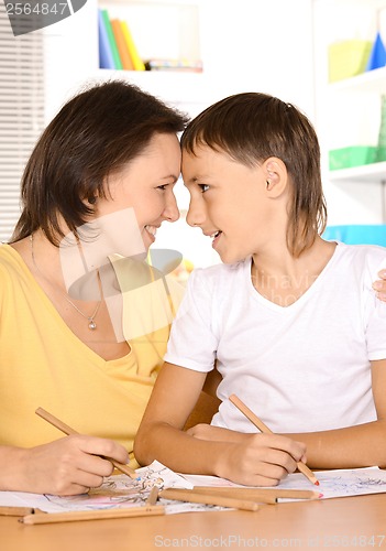 Image of Mother and son are drawing