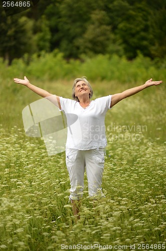 Image of Senior woman on a walk