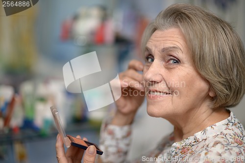 Image of Nice woman in the bathroom