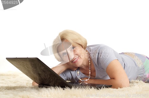 Image of Mature woman relaxing