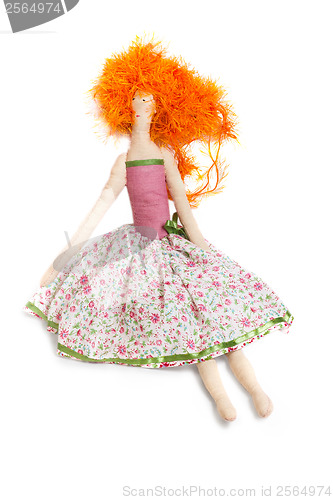 Image of homemade red rag toy girl