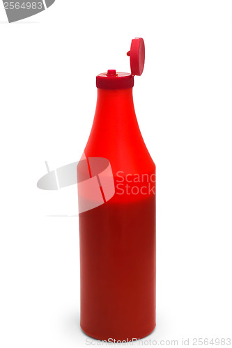 Image of red ketchup plastic bottle isolated on white background