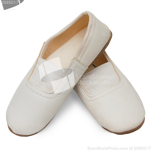 Image of old children's white  pink pointe shoes ballet slippers isolated