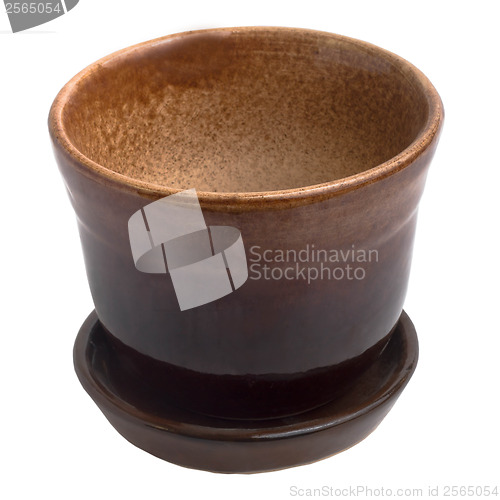Image of brown ceramic pot cup isolated on white background
