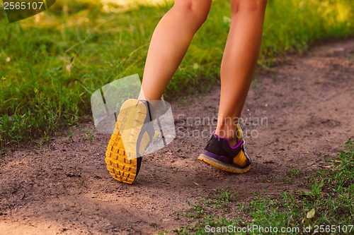 Image of sports a shoes female large legs running, exercising and walking