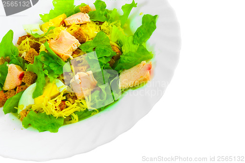 Image of salad appetizer with cheese, ham and egg fried bread and greens 