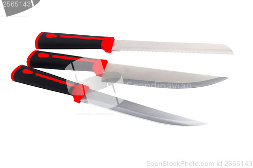 Image of three red kitchen knife on white (clipping path)