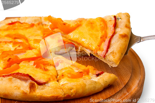 Image of Appetizing a pizza cheese wooden tray isolated on white backg