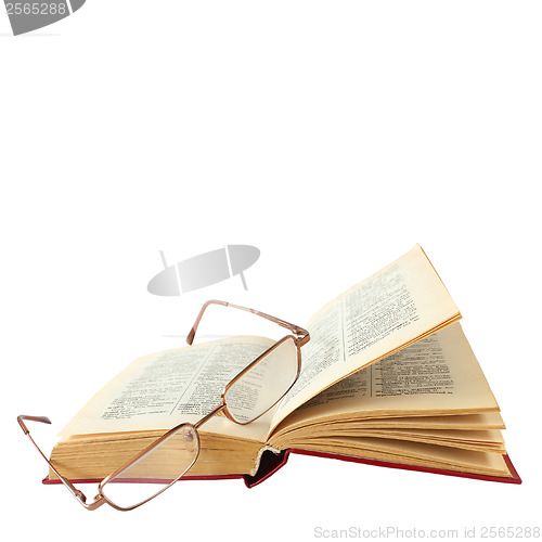 Image of book and glasses on a white background