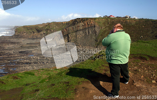 Image of photographer on cliff top