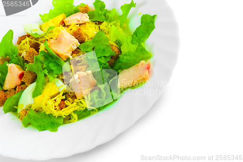 Image of salad appetizer with cheese, ham and egg fried bread and greens 