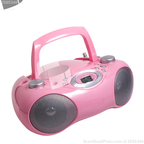 Image of pink stereo cd mp3 radio cassette recorder is isolated on a whit