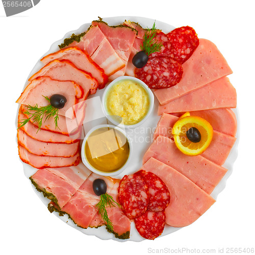 Image of sliced smoked ham sausage appetizer mustard, horseradish and dil